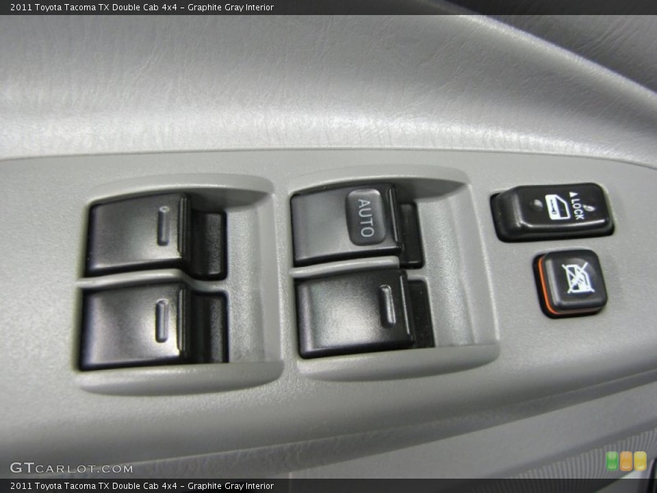 Graphite Gray Interior Controls for the 2011 Toyota Tacoma TX Double Cab 4x4 #68595905