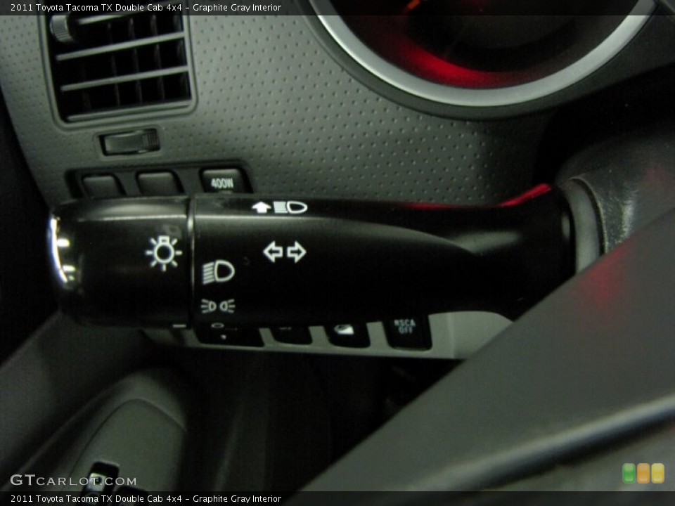 Graphite Gray Interior Controls for the 2011 Toyota Tacoma TX Double Cab 4x4 #68595959