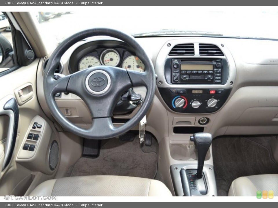 Taupe Interior Dashboard for the 2002 Toyota RAV4  #68599829