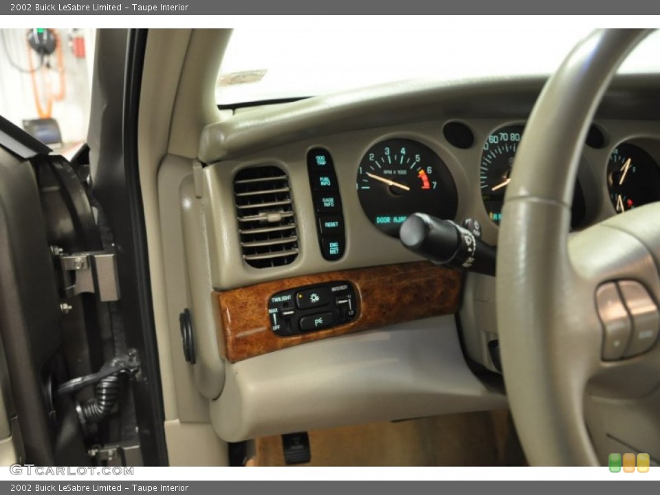 Taupe Interior Controls for the 2002 Buick LeSabre Limited #68602442