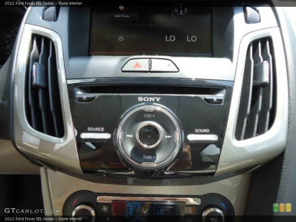 Stone Interior Controls for the 2012 Ford Focus SEL Sedan #68625337