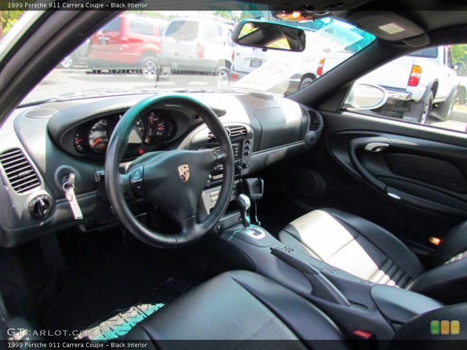 Black Interior Prime Interior for the 1999 Porsche 911 Carrera Coupe #68632957