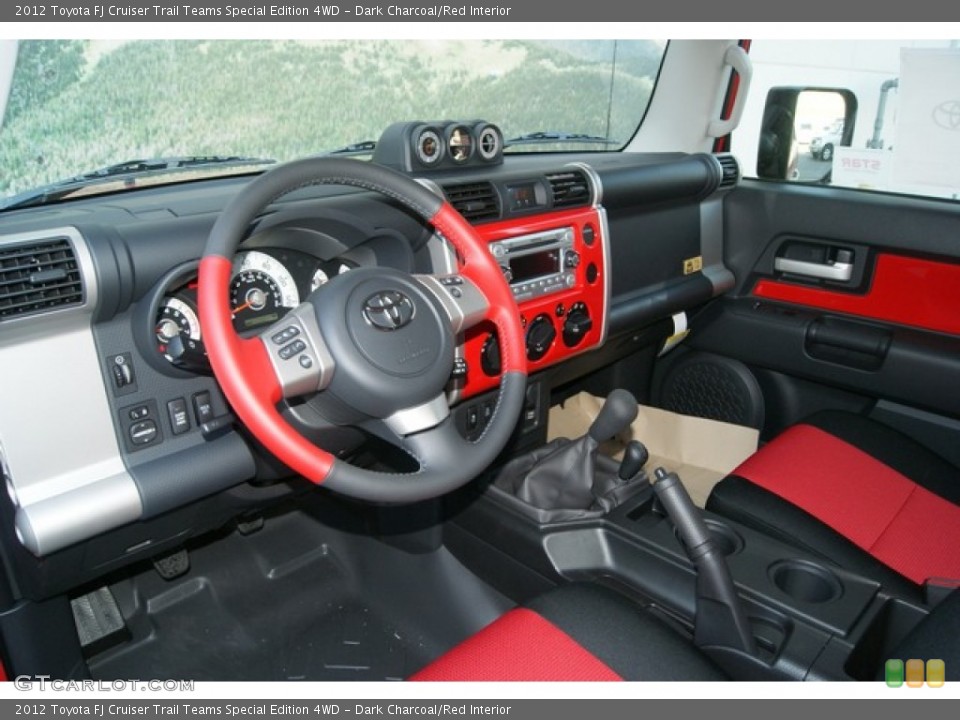 Dark Charcoal/Red Interior Prime Interior for the 2012 Toyota FJ Cruiser Trail Teams Special Edition 4WD #68655256