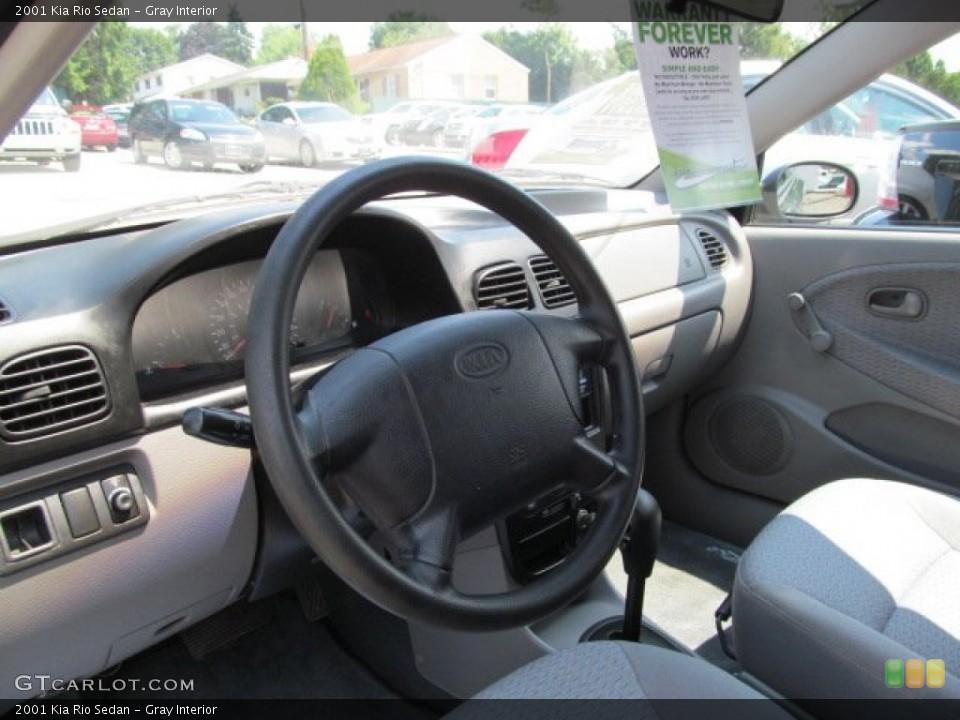 Gray Interior Steering Wheel for the 2001 Kia Rio Sedan #68672446
