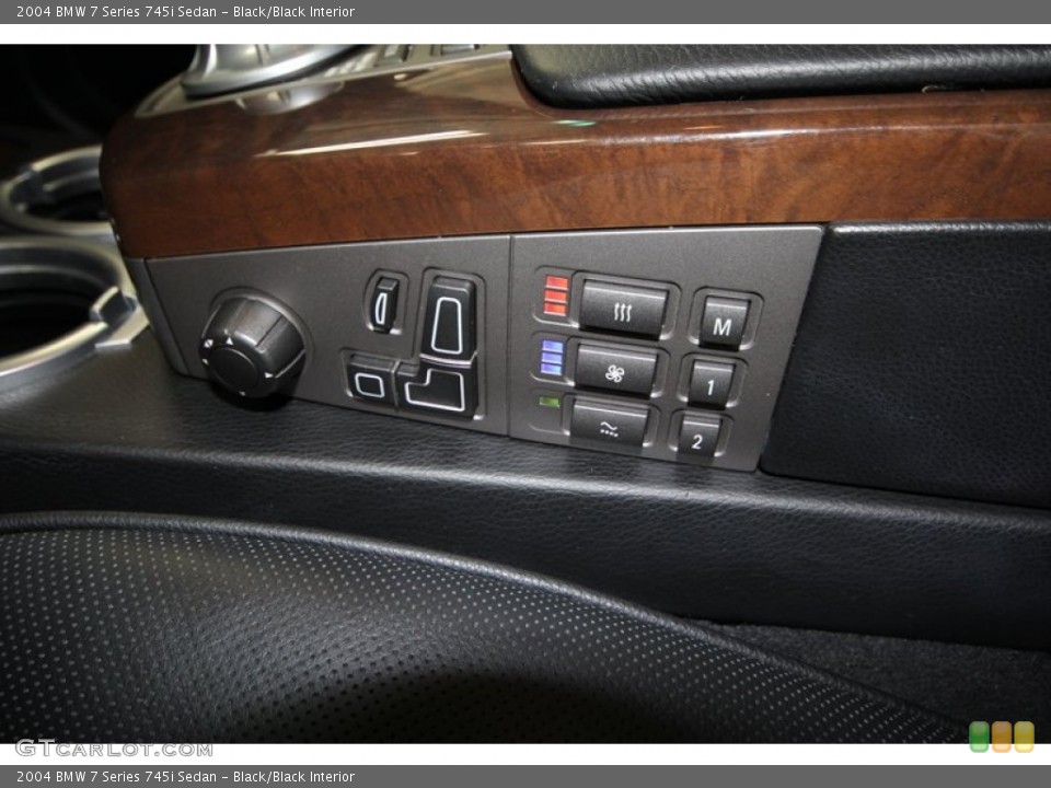 Black/Black Interior Controls for the 2004 BMW 7 Series 745i Sedan #68678600