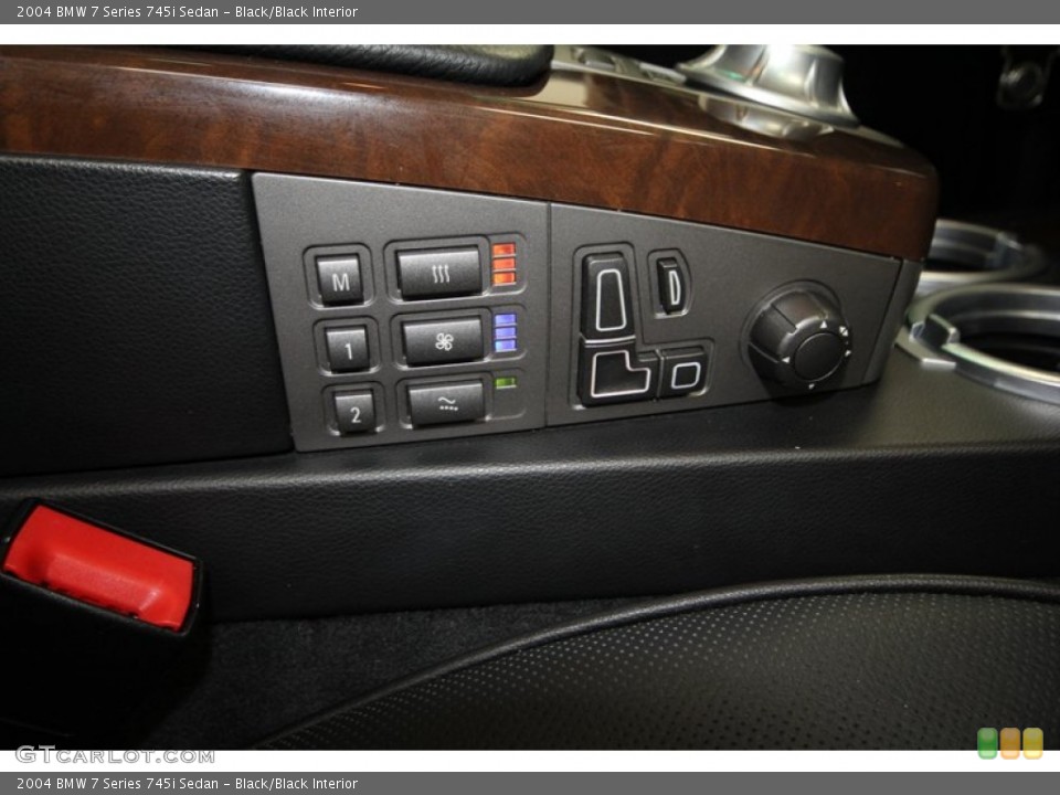 Black/Black Interior Controls for the 2004 BMW 7 Series 745i Sedan #68678761