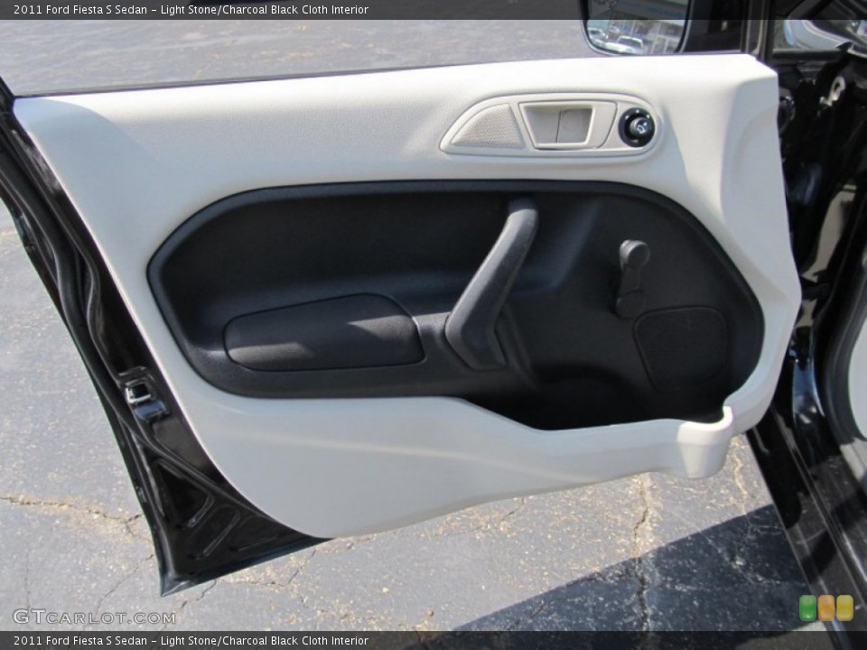 Light Stone/Charcoal Black Cloth Interior Door Panel for the 2011 Ford Fiesta S Sedan #68679284