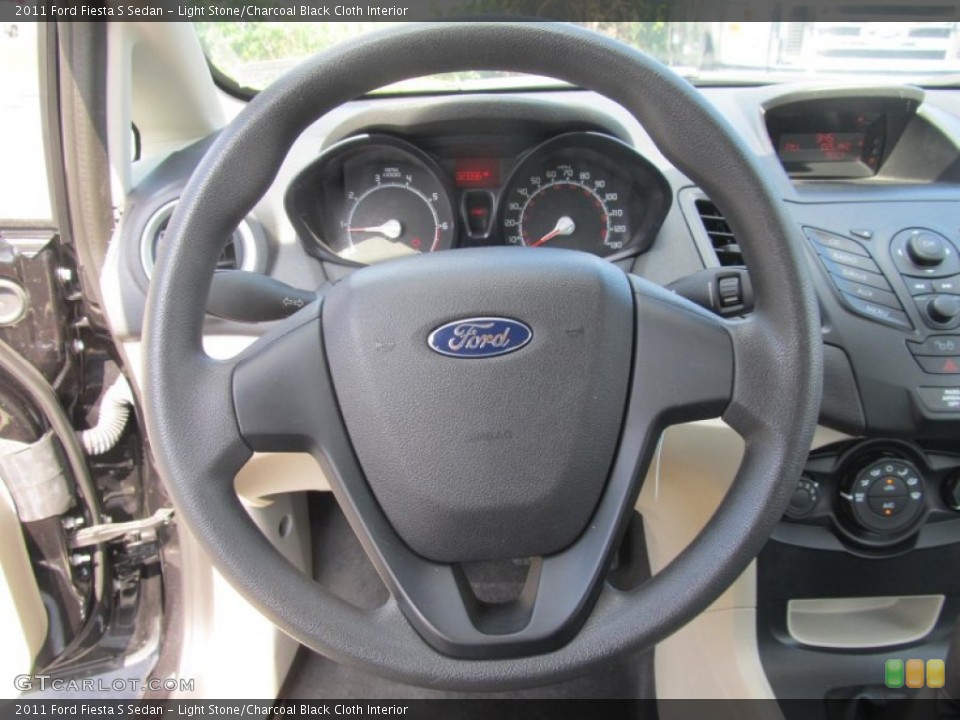 Light Stone/Charcoal Black Cloth Interior Steering Wheel for the 2011 Ford Fiesta S Sedan #68679310