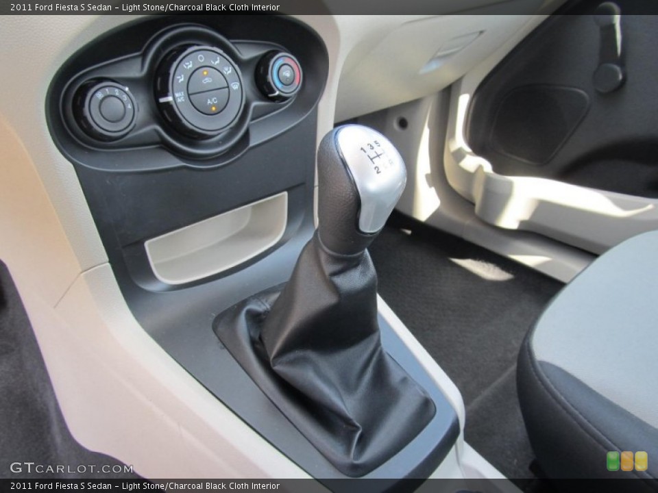 Light Stone/Charcoal Black Cloth Interior Transmission for the 2011 Ford Fiesta S Sedan #68679331