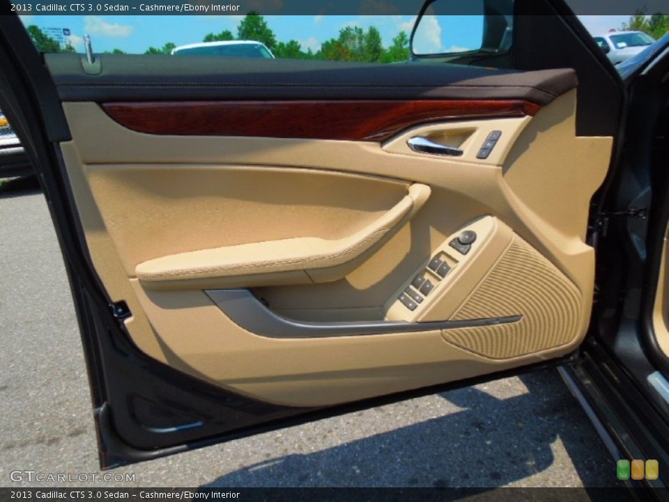 Cashmere/Ebony Interior Door Panel for the 2013 Cadillac CTS 3.0 Sedan #68702749