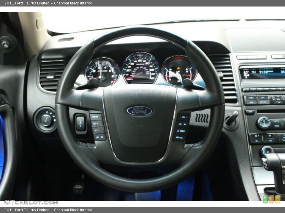 Charcoal Black Interior Steering Wheel for the 2011 Ford Taurus Limited #68715529