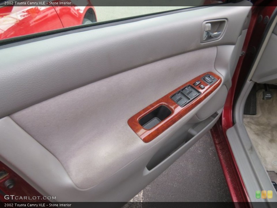 Stone Interior Door Panel for the 2002 Toyota Camry XLE #68739199