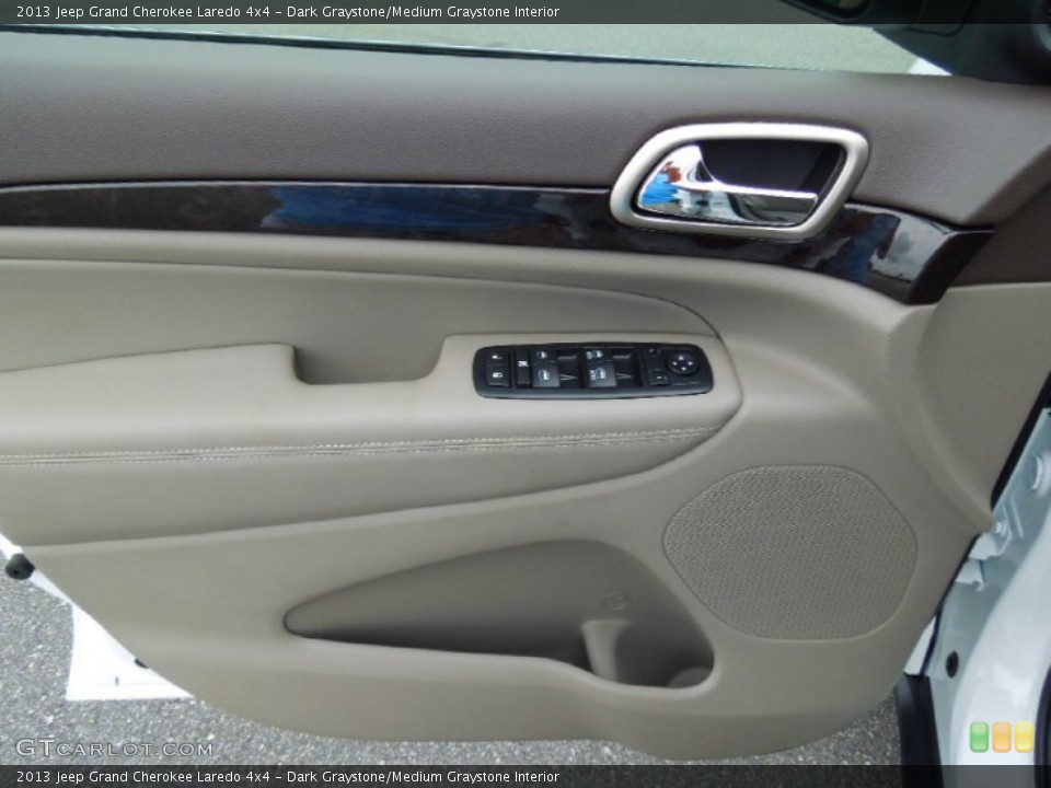 Dark Graystone/Medium Graystone Interior Door Panel for the 2013 Jeep Grand Cherokee Laredo 4x4 #68747884
