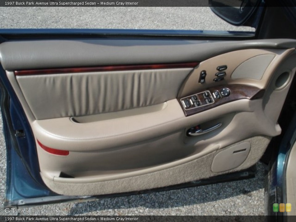 Medium Gray Interior Door Panel for the 1997 Buick Park Avenue Ultra Supercharged Sedan #68765887