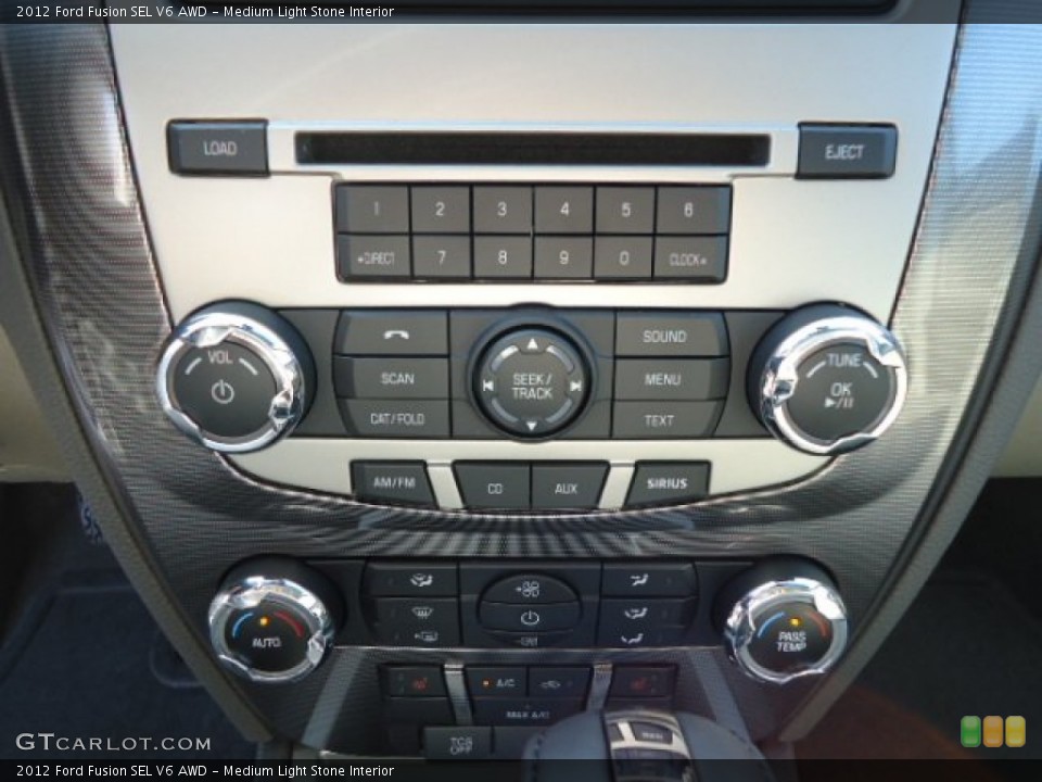 Medium Light Stone Interior Controls for the 2012 Ford Fusion SEL V6 AWD #68775140