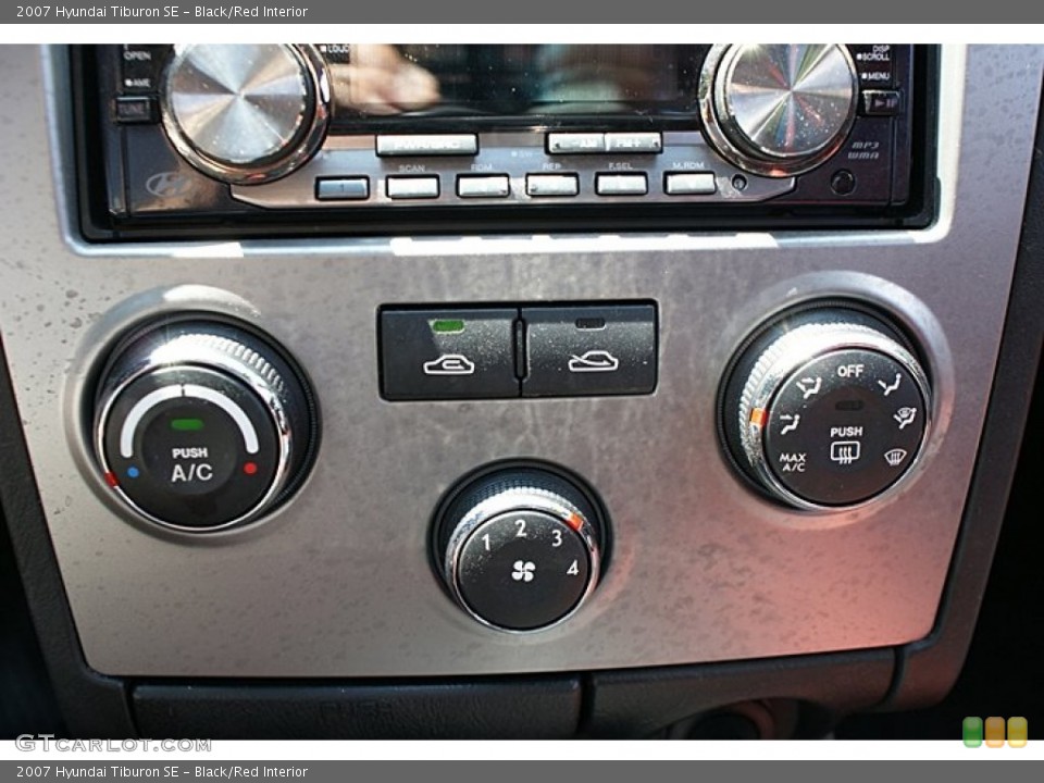 Black/Red Interior Controls for the 2007 Hyundai Tiburon SE #68780360