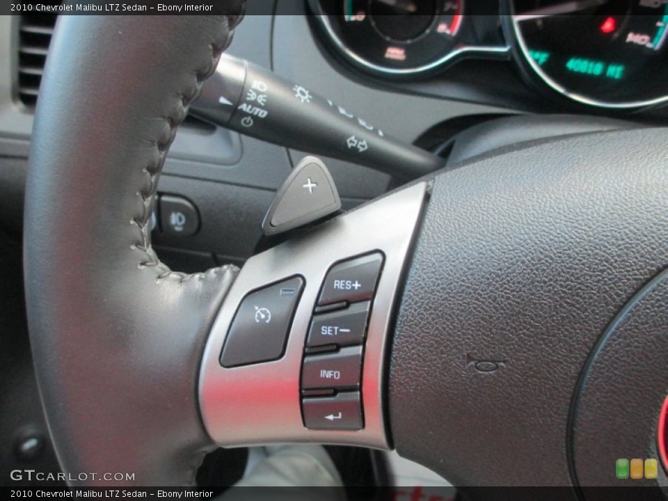 Ebony Interior Controls for the 2010 Chevrolet Malibu LTZ Sedan #68804192