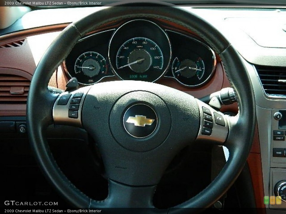 Ebony/Brick Interior Steering Wheel for the 2009 Chevrolet Malibu LTZ Sedan #68815010