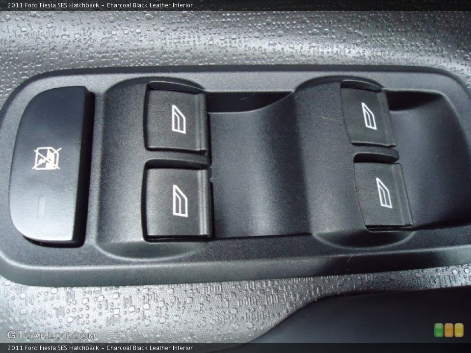 Charcoal Black Leather Interior Controls for the 2011 Ford Fiesta SES Hatchback #68830392