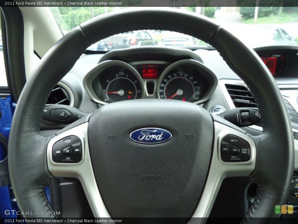Charcoal Black Leather Interior Steering Wheel for the 2011 Ford Fiesta SES Hatchback #68830511