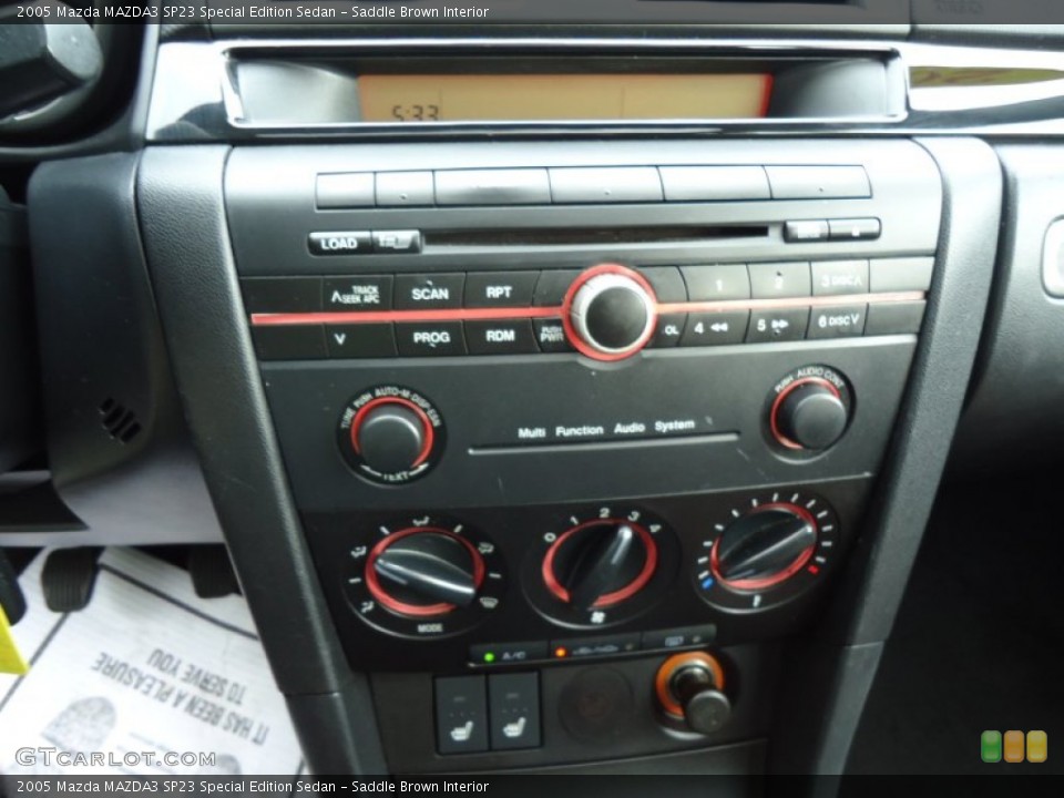 Saddle Brown Interior Controls for the 2005 Mazda MAZDA3 SP23 Special Edition Sedan #68831217