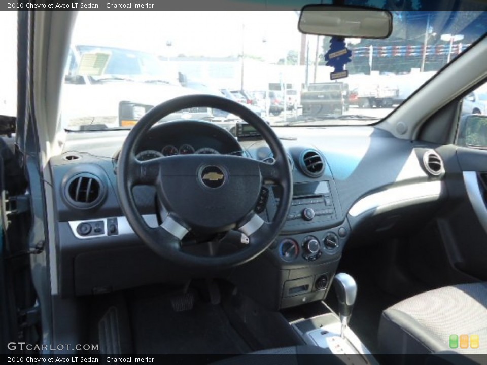 Charcoal Interior Dashboard for the 2010 Chevrolet Aveo LT Sedan #68845792
