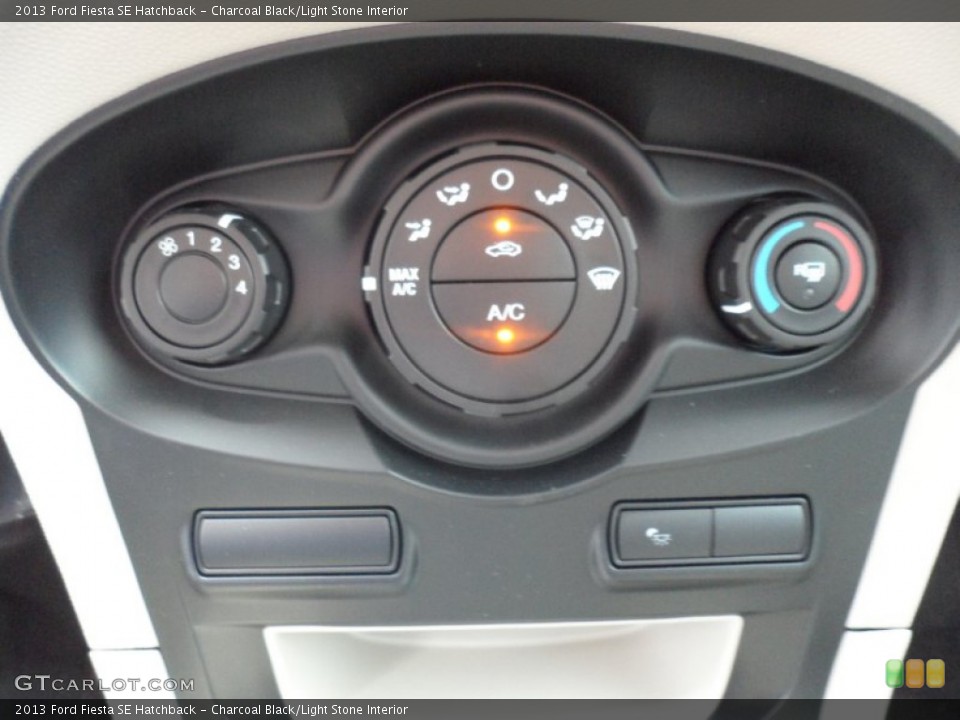 Charcoal Black/Light Stone Interior Controls for the 2013 Ford Fiesta SE Hatchback #68864946