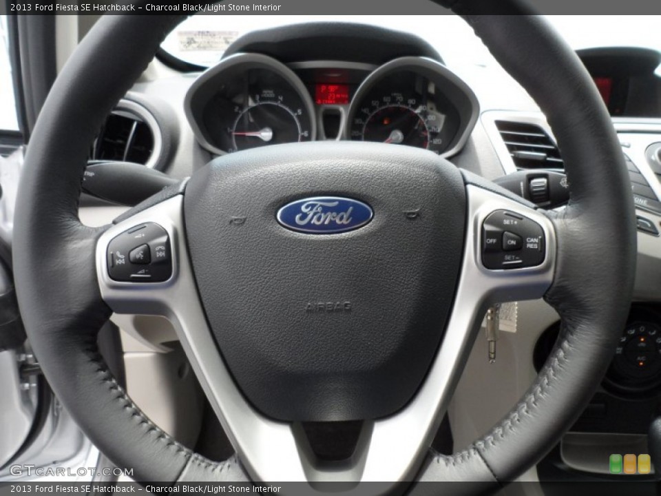 Charcoal Black/Light Stone Interior Steering Wheel for the 2013 Ford Fiesta SE Hatchback #68864961