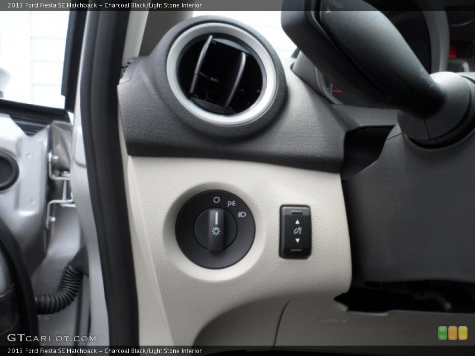 Charcoal Black/Light Stone Interior Controls for the 2013 Ford Fiesta SE Hatchback #68864979