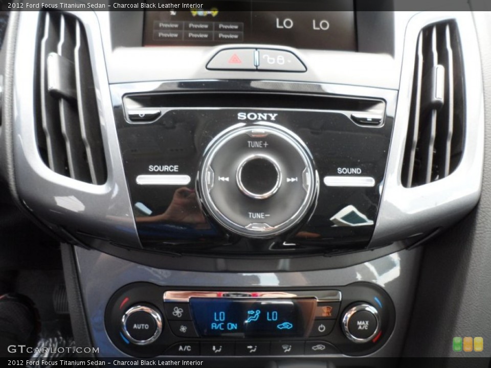 Charcoal Black Leather Interior Controls for the 2012 Ford Focus Titanium Sedan #68867172