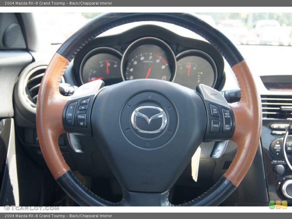 Black/Chapparal Interior Steering Wheel for the 2004 Mazda RX-8 Grand Touring #68937660