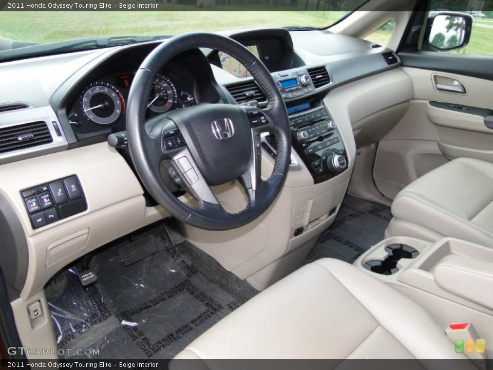 Beige Interior Prime Interior for the 2011 Honda Odyssey Touring Elite #68947122