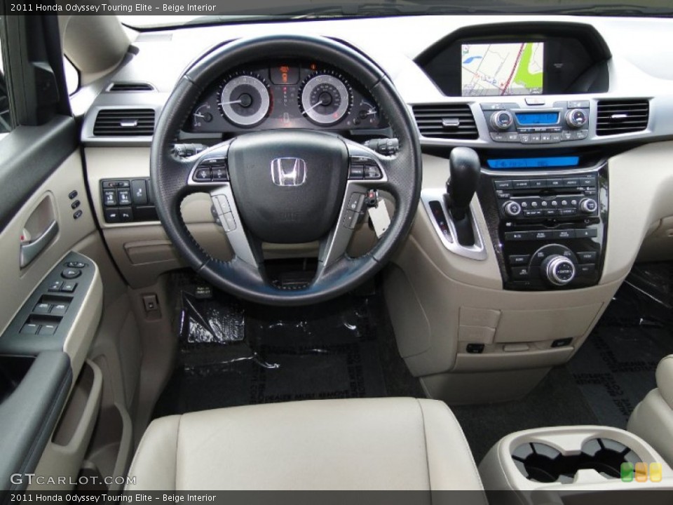 Beige Interior Dashboard for the 2011 Honda Odyssey Touring Elite #68947176