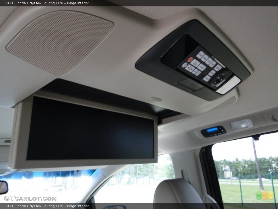 Beige Interior Controls for the 2011 Honda Odyssey Touring Elite #68947230