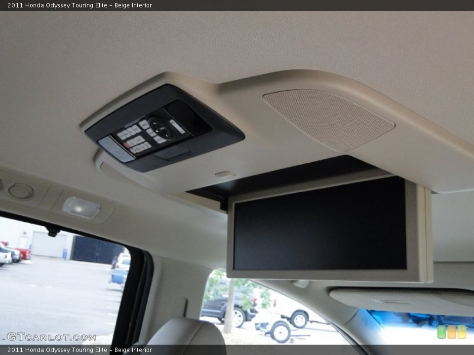 Beige Interior Controls for the 2011 Honda Odyssey Touring Elite #68947235