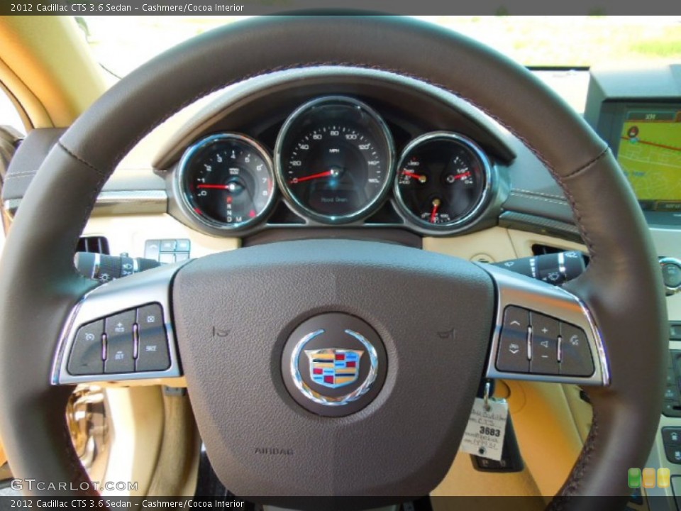 Cashmere/Cocoa Interior Steering Wheel for the 2012 Cadillac CTS 3.6 Sedan #68979677