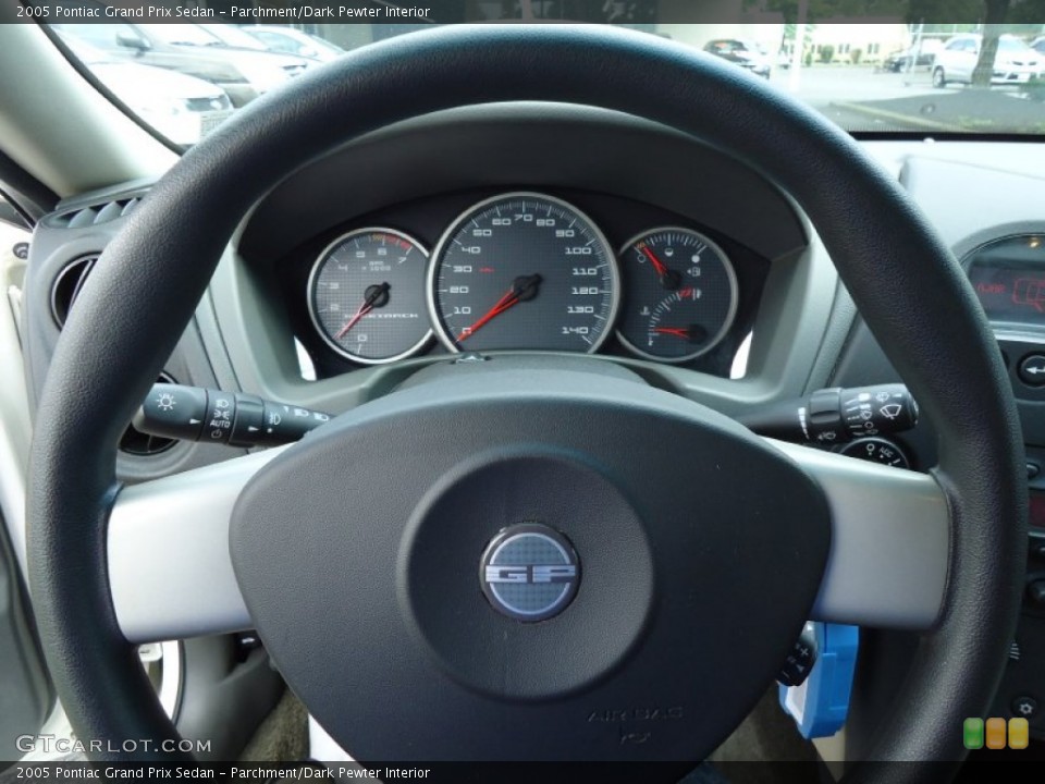 Parchment/Dark Pewter Interior Steering Wheel for the 2005 Pontiac Grand Prix Sedan #68990300