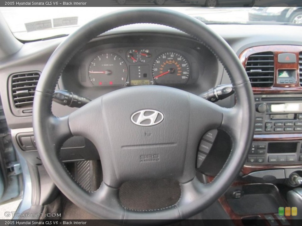 Black Interior Steering Wheel for the 2005 Hyundai Sonata GLS V6 #69038618