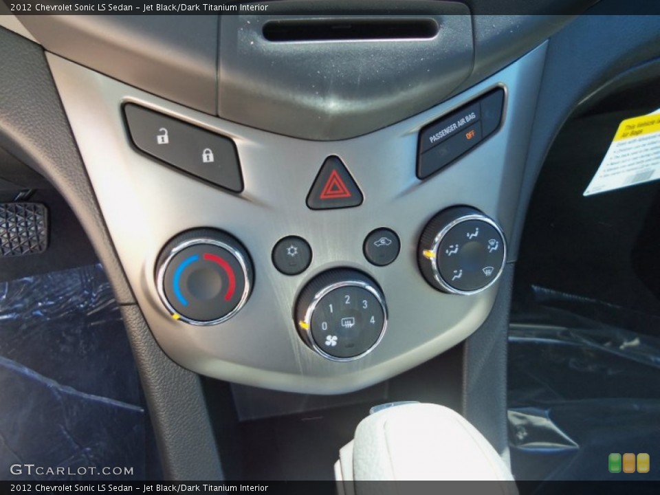 Jet Black/Dark Titanium Interior Controls for the 2012 Chevrolet Sonic LS Sedan #69053603