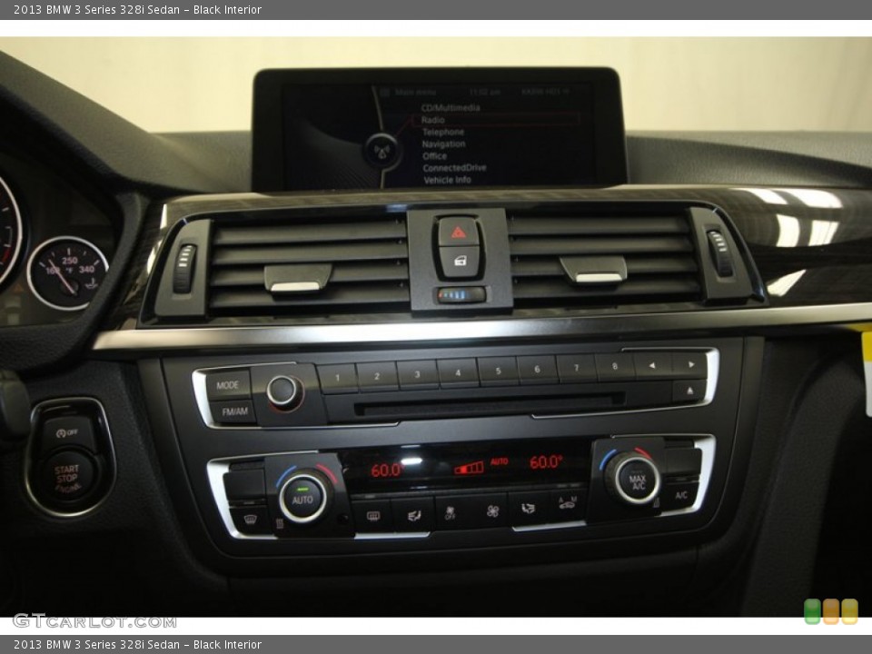 Black Interior Controls for the 2013 BMW 3 Series 328i Sedan #69057392