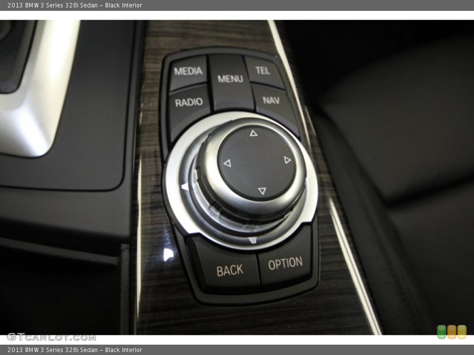 Black Interior Controls for the 2013 BMW 3 Series 328i Sedan #69057410