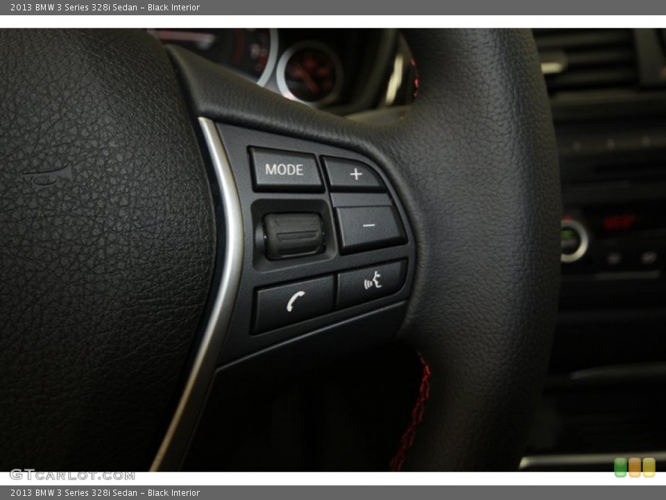 Black Interior Controls for the 2013 BMW 3 Series 328i Sedan #69057437