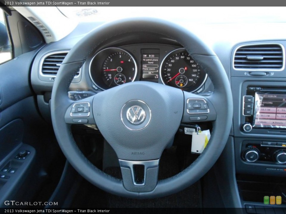 Titan Black Interior Steering Wheel for the 2013 Volkswagen Jetta TDI SportWagen #69060649