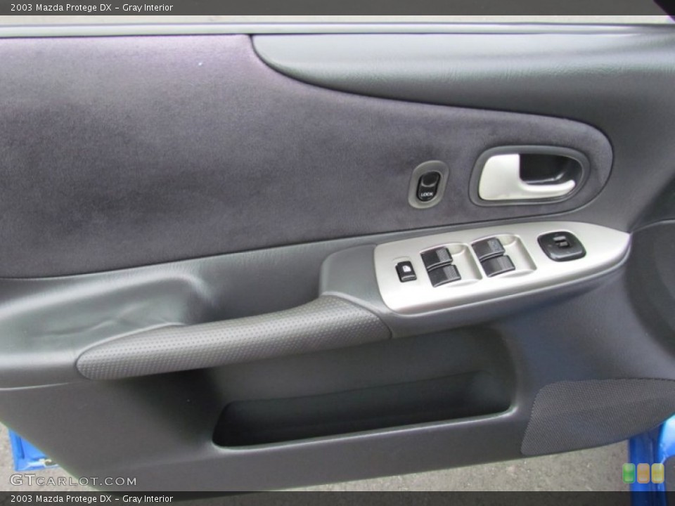 Gray Interior Door Panel for the 2003 Mazda Protege DX #69097408