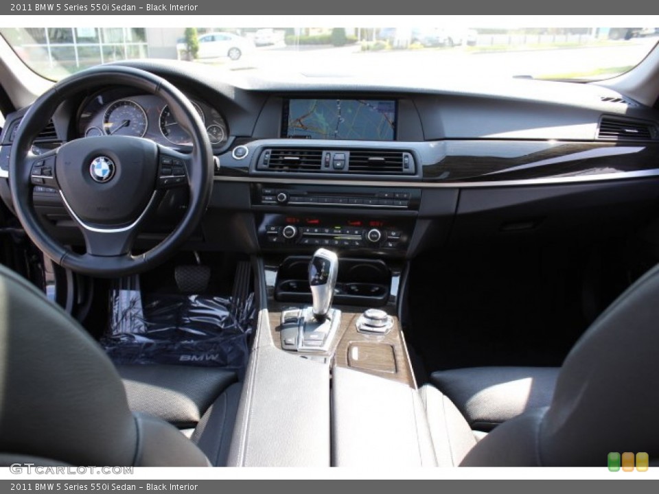 Black Interior Dashboard for the 2011 BMW 5 Series 550i Sedan #69114589