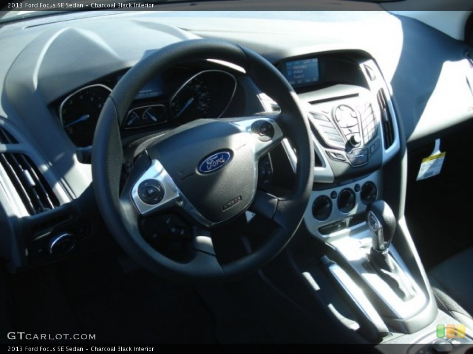Charcoal Black Interior Dashboard for the 2013 Ford Focus SE Sedan #69147203
