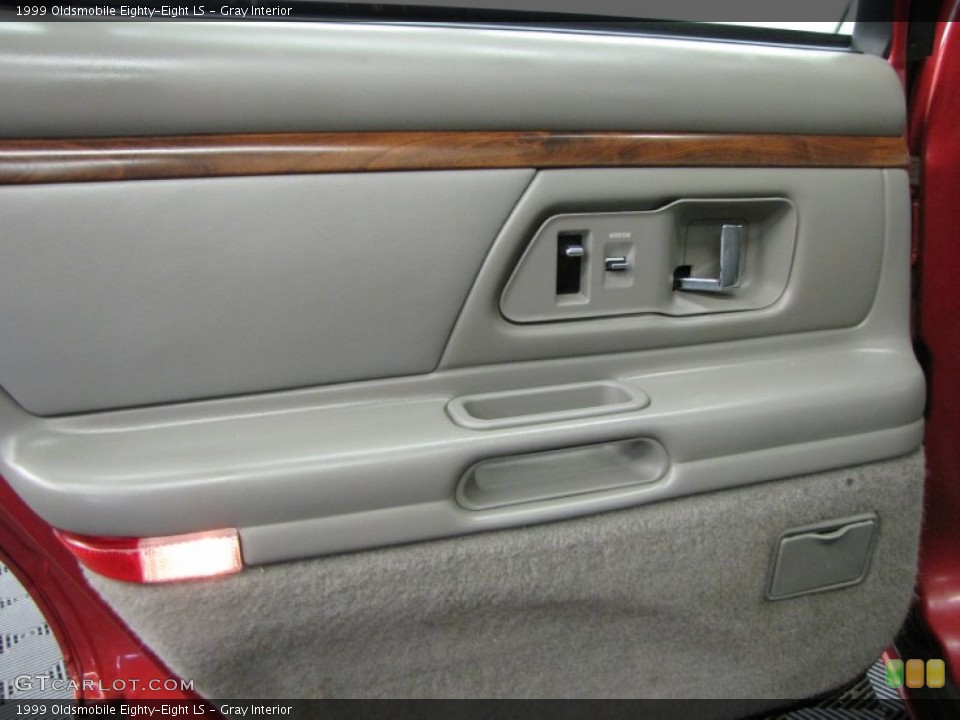 Gray Interior Door Panel for the 1999 Oldsmobile Eighty-Eight LS #69172228