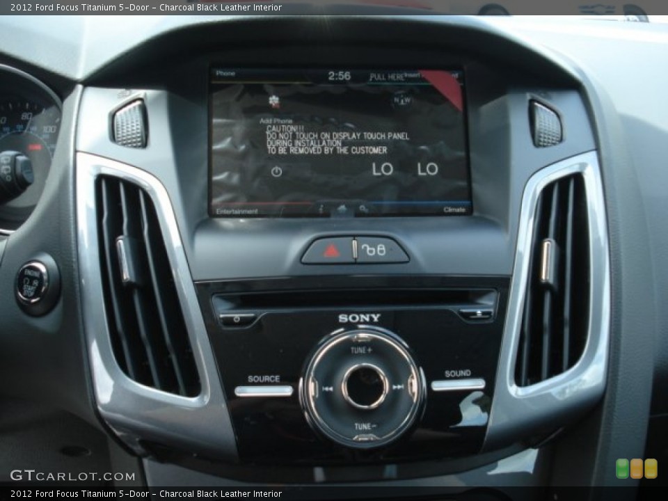 Charcoal Black Leather Interior Controls for the 2012 Ford Focus Titanium 5-Door #69218910