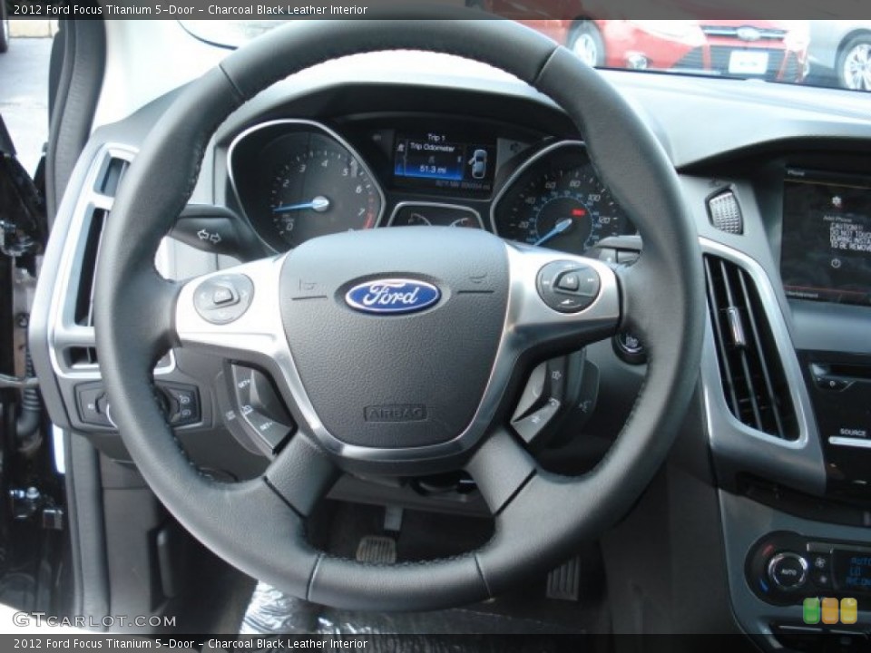 Charcoal Black Leather Interior Steering Wheel for the 2012 Ford Focus Titanium 5-Door #69218925