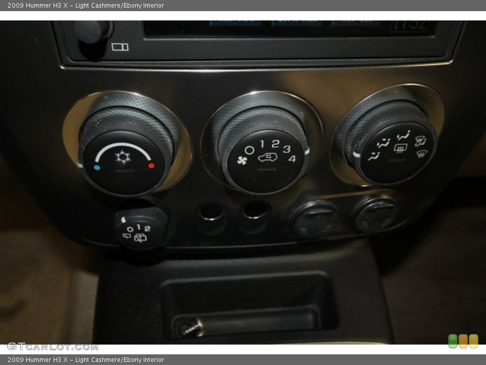 Light Cashmere/Ebony Interior Controls for the 2009 Hummer H3 X #69229797